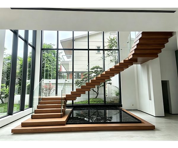 Custom floating staircase manufacturer NST Building