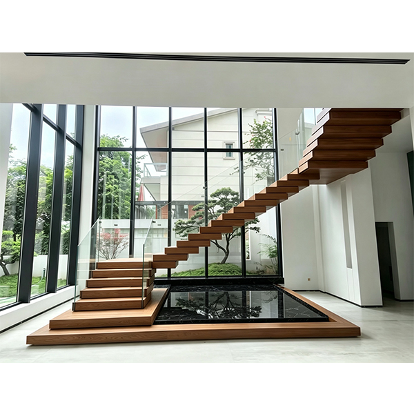 Custom floating staircase manufacturer NST Building