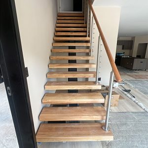 custom floating staircase with cable railing in North Carolina 